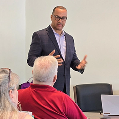 Nathan Cox, President/CEO of InRoads, teaching a group of people