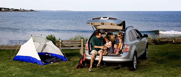 A family enjoys the great outdoors in their new SUV