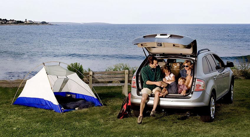 A family enjoys the great outdoors in their new SUV