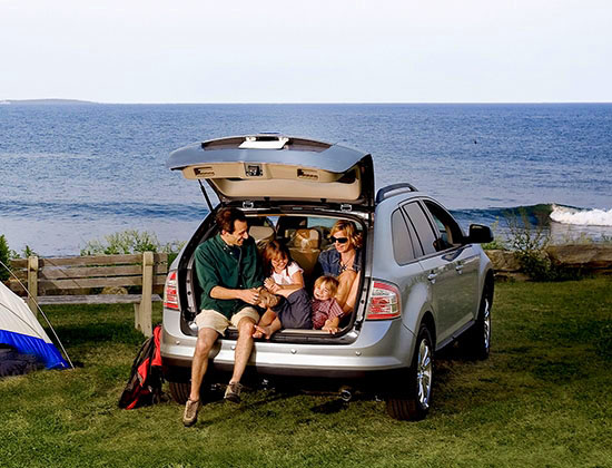 A family enjoys the great outdoors in their new SUV