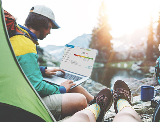 Couple of backpackers hiking and camping in wild