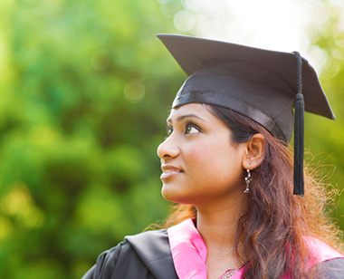 graduating student in cap and gown