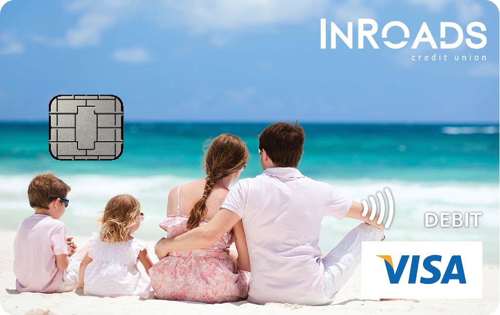 debit card with photo of family sitting on the beach. Includes InRoads logo.