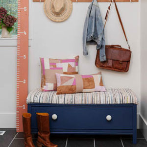 old dresser painted and repurposed into a bench seat