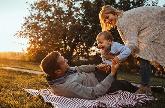 Cute little family is having fun outdoors