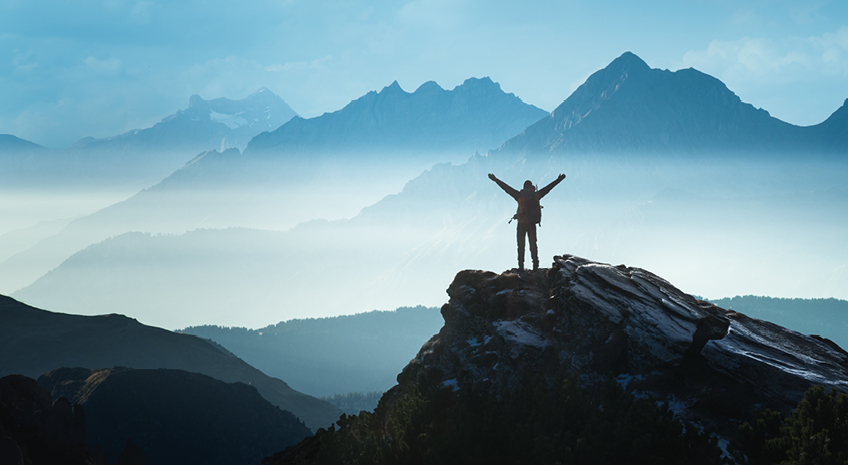 Positive man celebrating success stock photo Mountain, Mountain Peak, On Top Of, Conquering Adversity, People