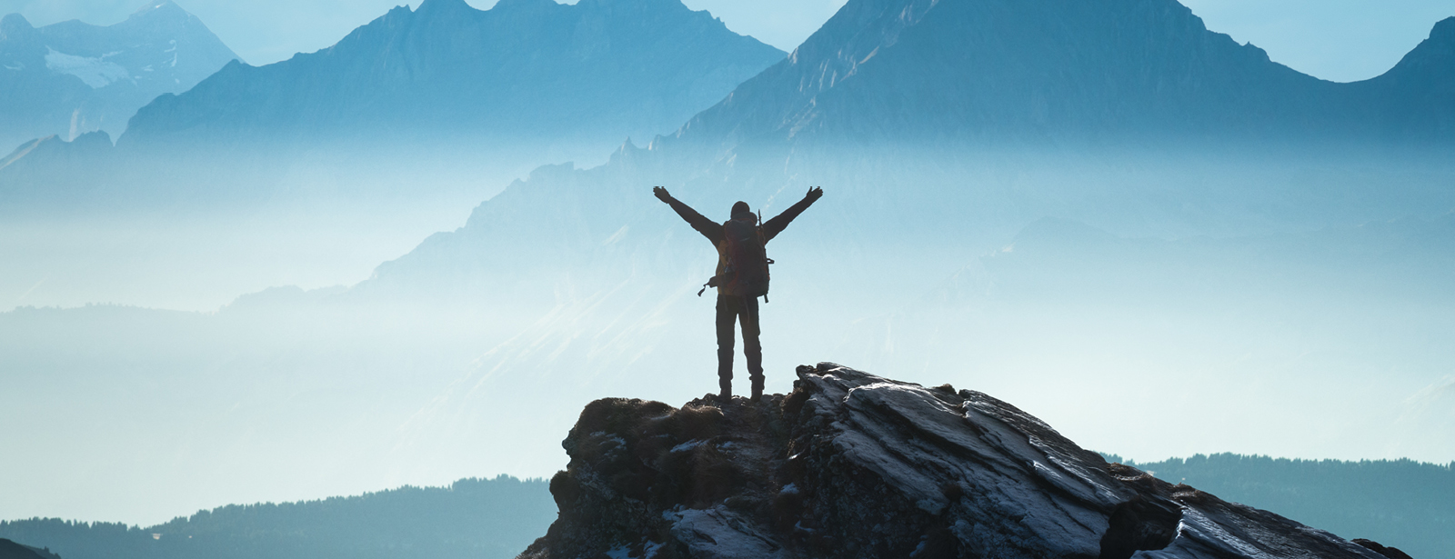 Positive man celebrating success stock photo Mountain, Mountain Peak, On Top Of, Conquering Adversity, People