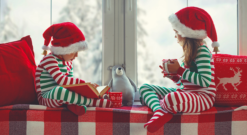 Children girl and boy is sad on Christmas morning by the window stock photo Christmas, Family, Child, Pajamas, Winter
