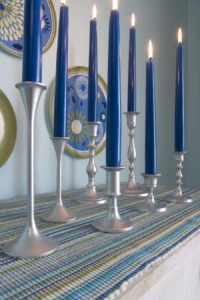 silver candlesticks with blue taper candles