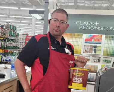 male employee at paint counter