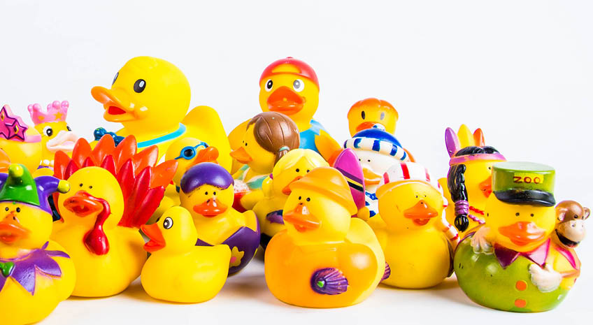 selection of rubber ducks on a white background