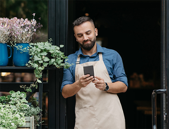 businessman looking at phone