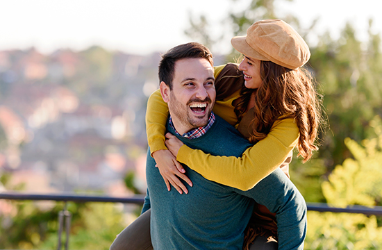 Beautiful young romantic couple in love having fun and feeling happy